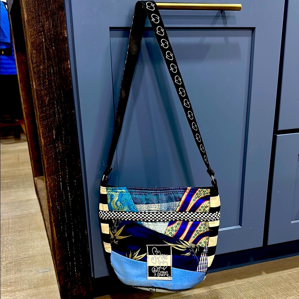 Silver Plum Multicolor Crossbody Bag
Beautiful condition - no flaws & unique